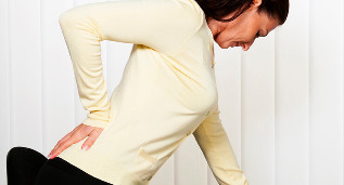The back pain of woman